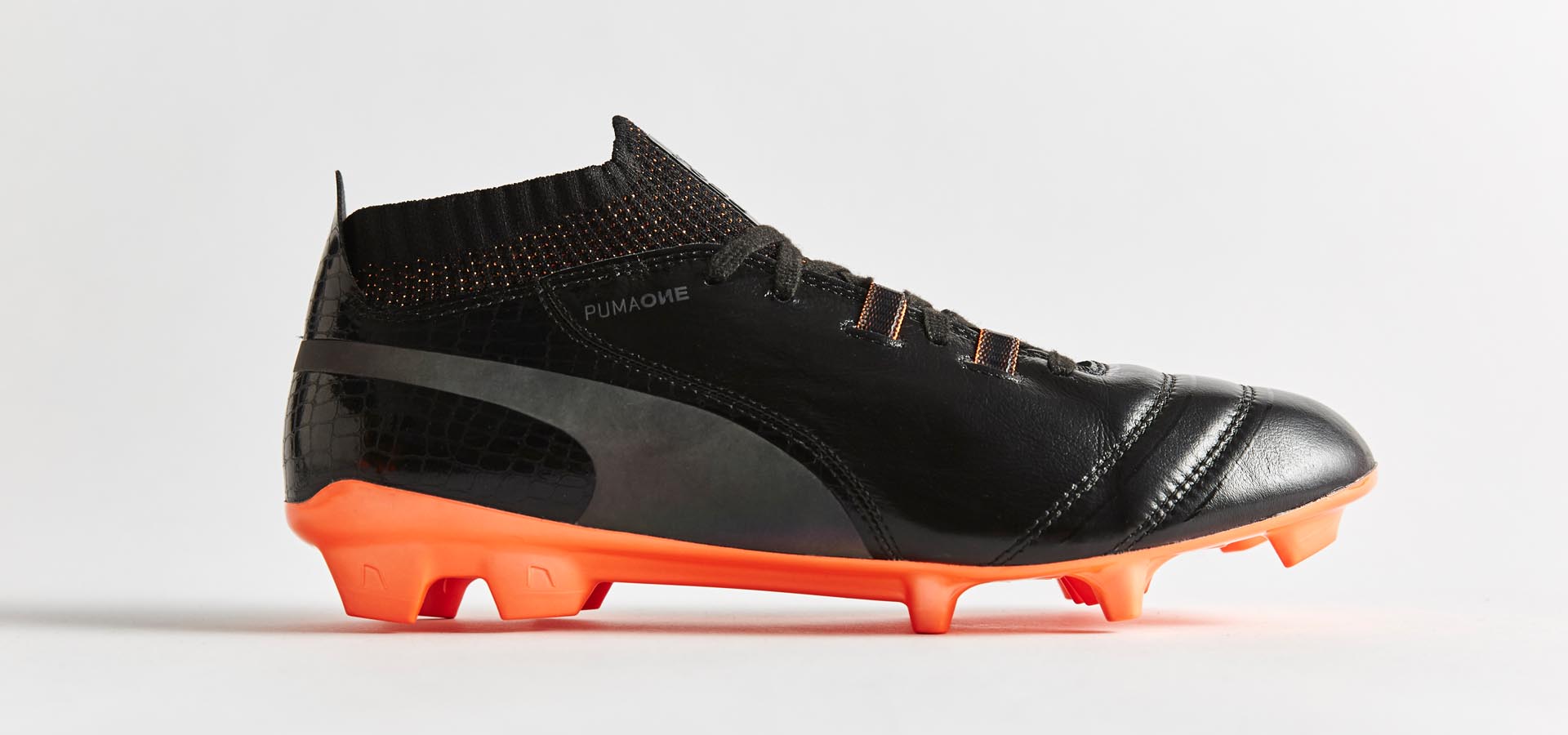 puma one black orange