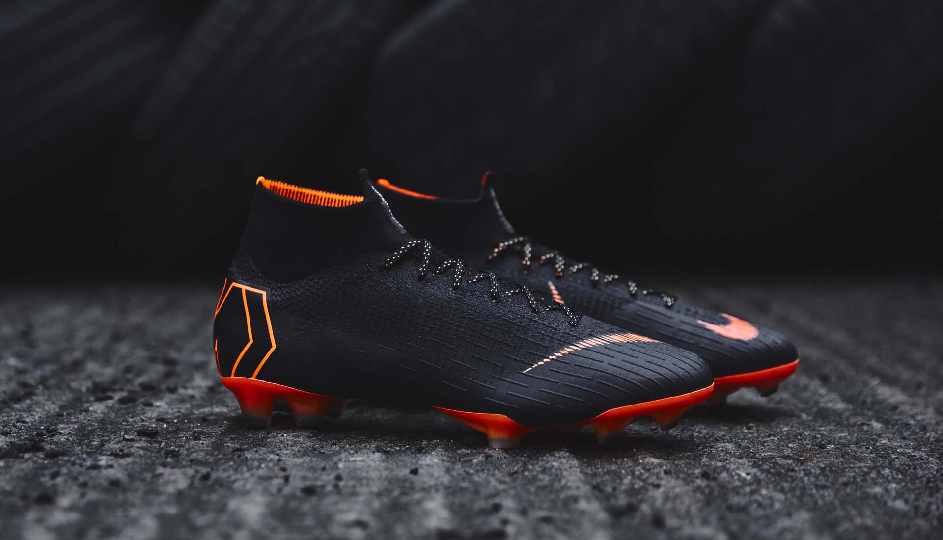 nike mercurial black and orange