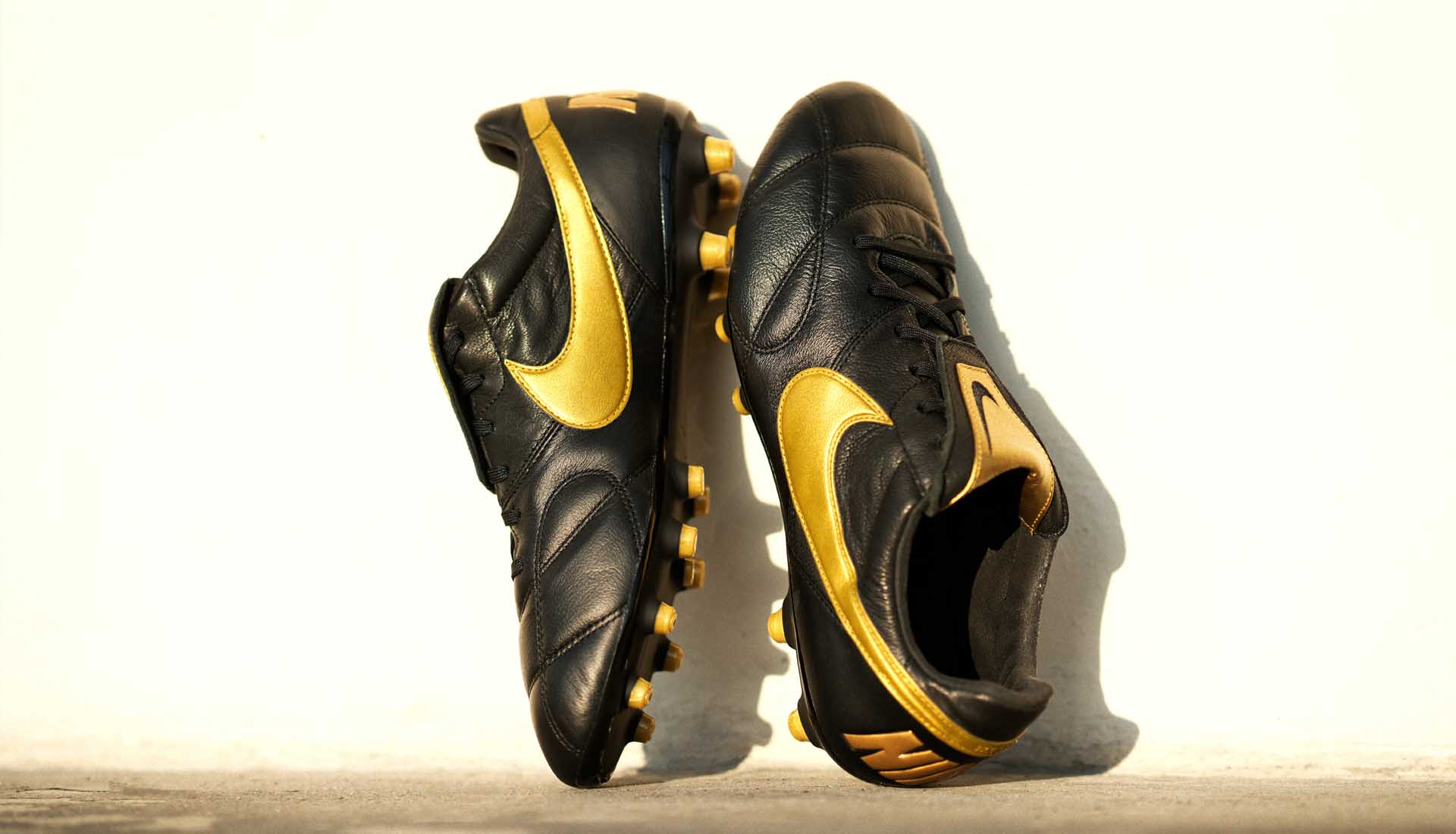 nike black gold football boots