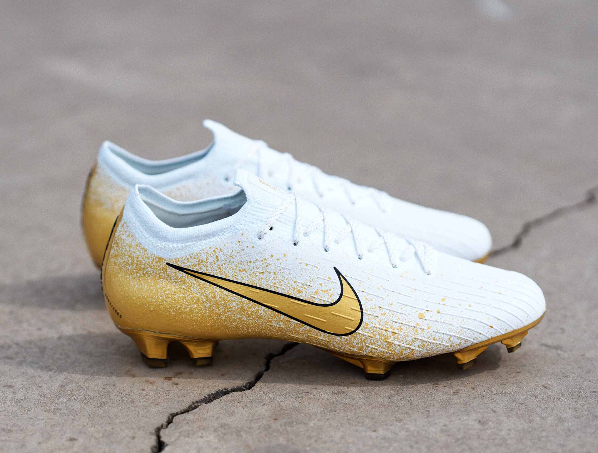 gold nike boots